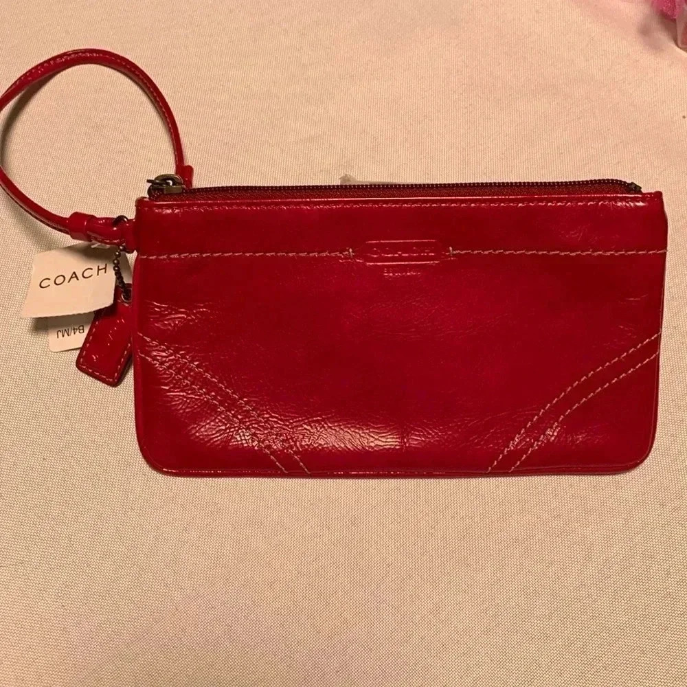 COACH Wristlet, patent leather. NWT.